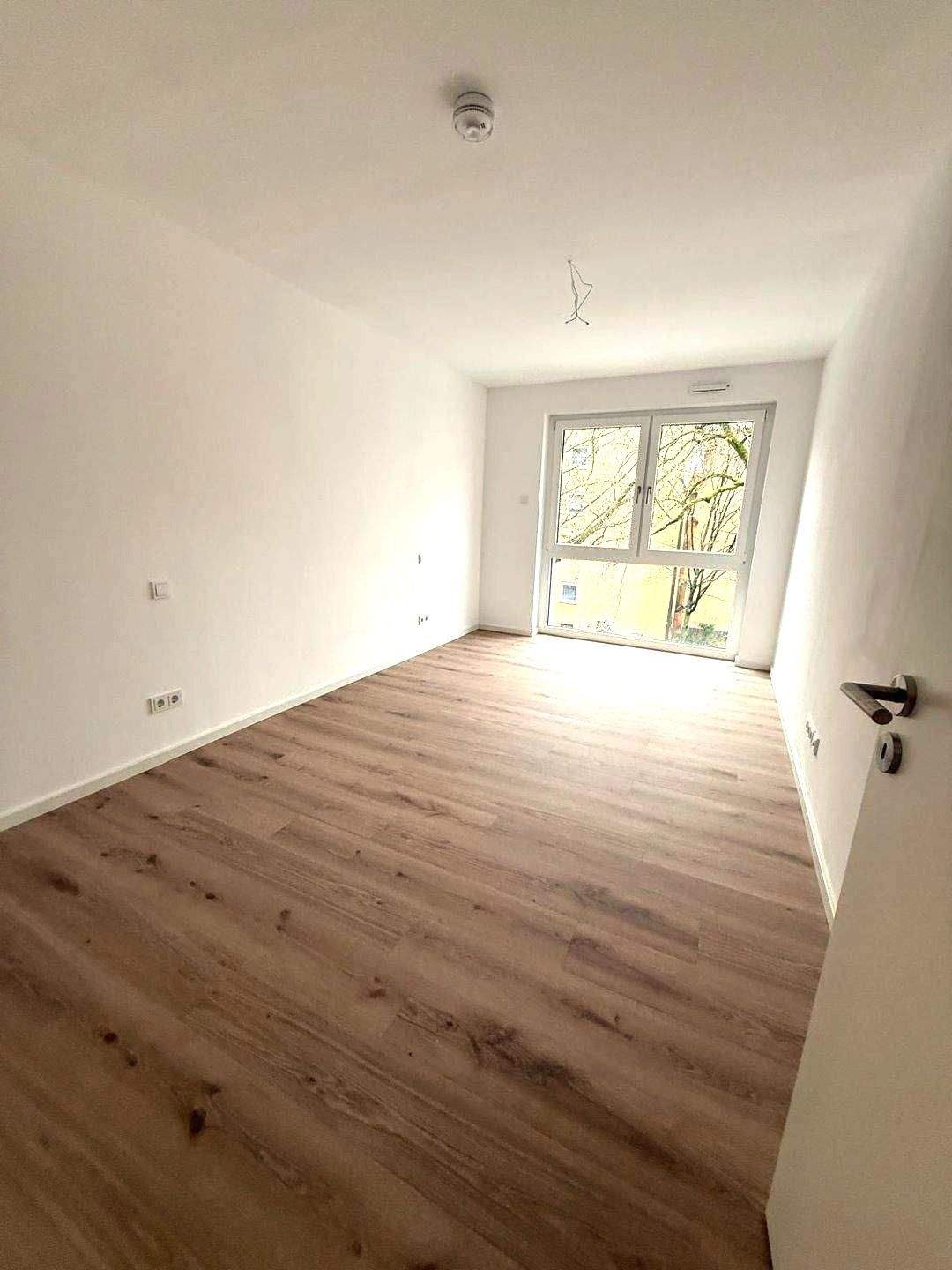 Exklusiver Neubau: Perfekt geschnittene 2-Zimmer-Wohnung mit Balkon | EBK | TG | Fußbodenheizung – Nürnberg – Vorschaubild 7