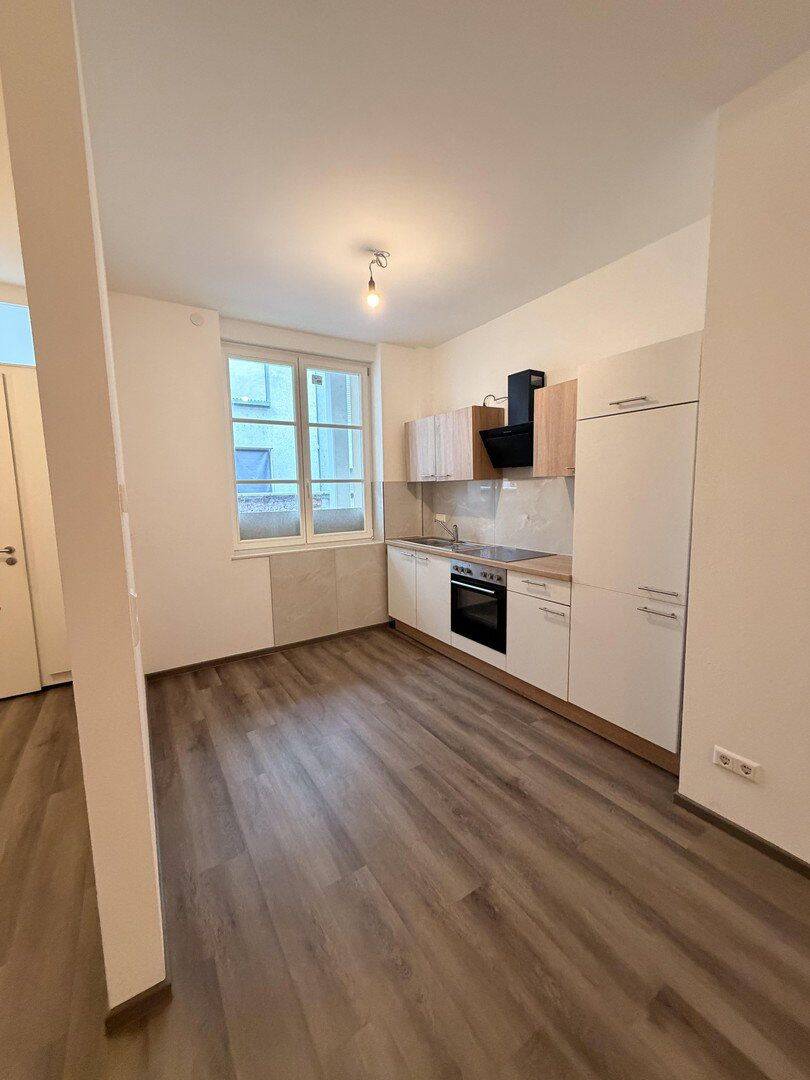 Gepflegte und Sanierte 2,5-Zimmer Wohnung im EG in Pforzheim inkl. EBK und Fußbodenheizung – Pforzheim – Bild 1 von 9