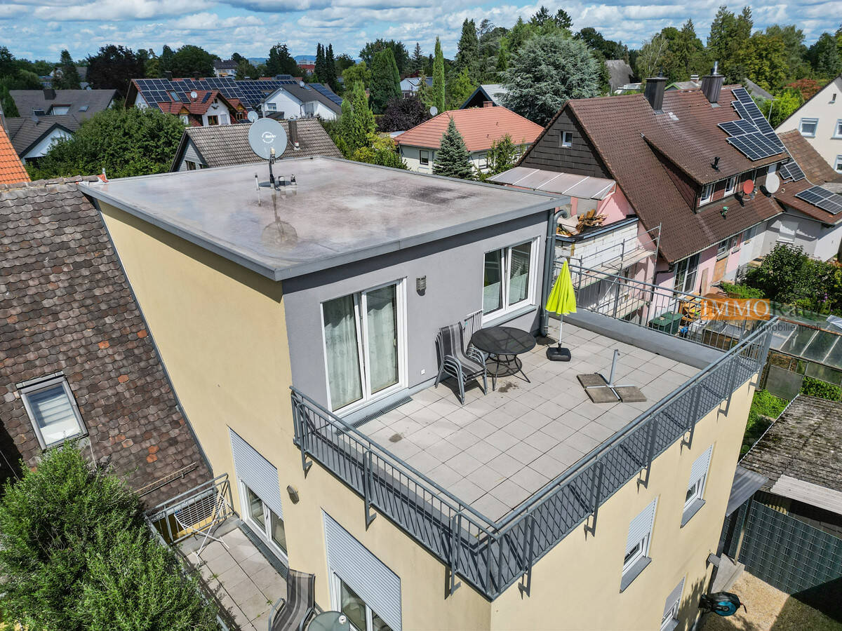 IMMORath.de - Zwei Wohnhäuser mit fünf Wohnungen und großzügigen Terrassen