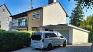 Freistehendes Einfamilienhaus mit Traumgarten