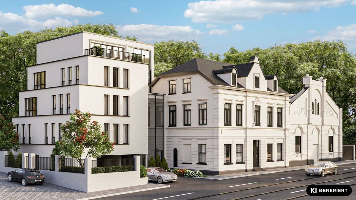 Dachgeschosswohnung mit zwei Balkonen in der denkmalgeschützten Löwenburg – 40629 Düsseldorf – Bild 1 von 9