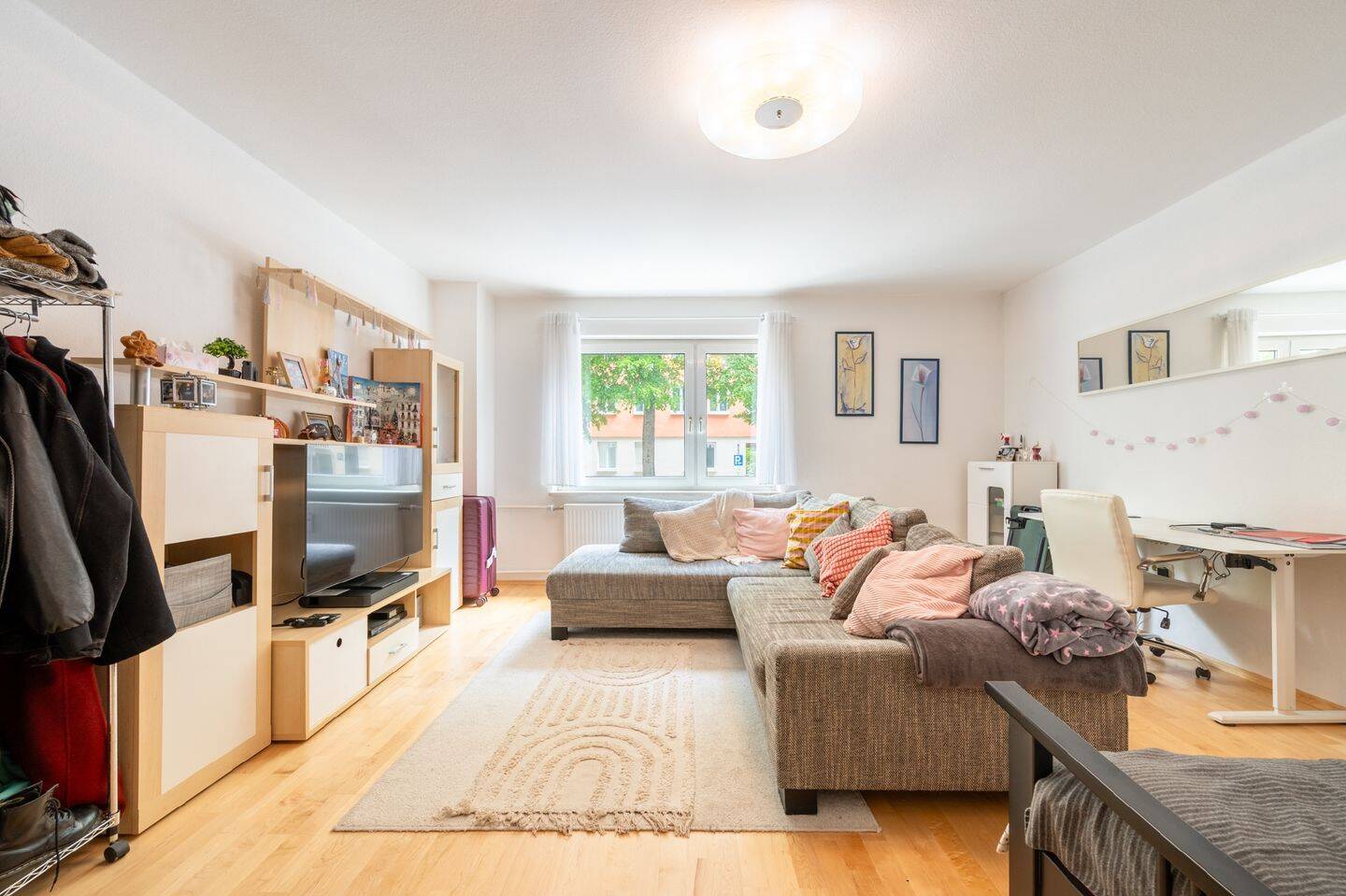 AIGNER - Großzügige 1-Zimmer-Wohnung mit Balkon in Schwabing-West