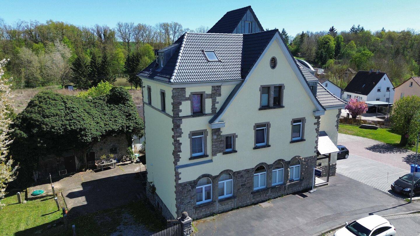 Teilmodernisiertes 8-Familienhaus mit Wertsteigerung durch zusätzliches potenzielles Baugrundstück – Kirchheim – Vorschaubild 3