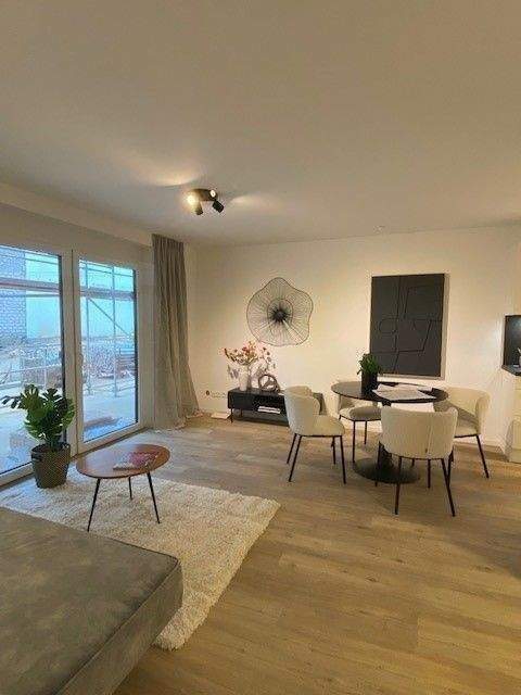 Exklusiv wohnen: Moderne 3-Zimmer-Neubauwohnung mit Balkon & Tiefgaragenstellplatz in Toplage