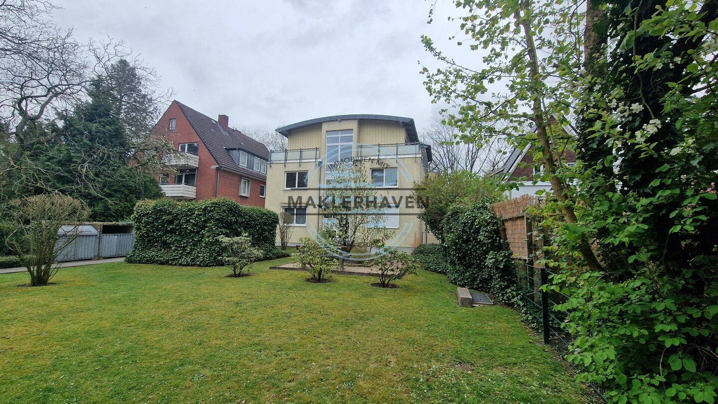 Stilvolles Wohnen: Moderne, helle Erdgeschoß-Eigentumswohnung mit Terrasse & Garten