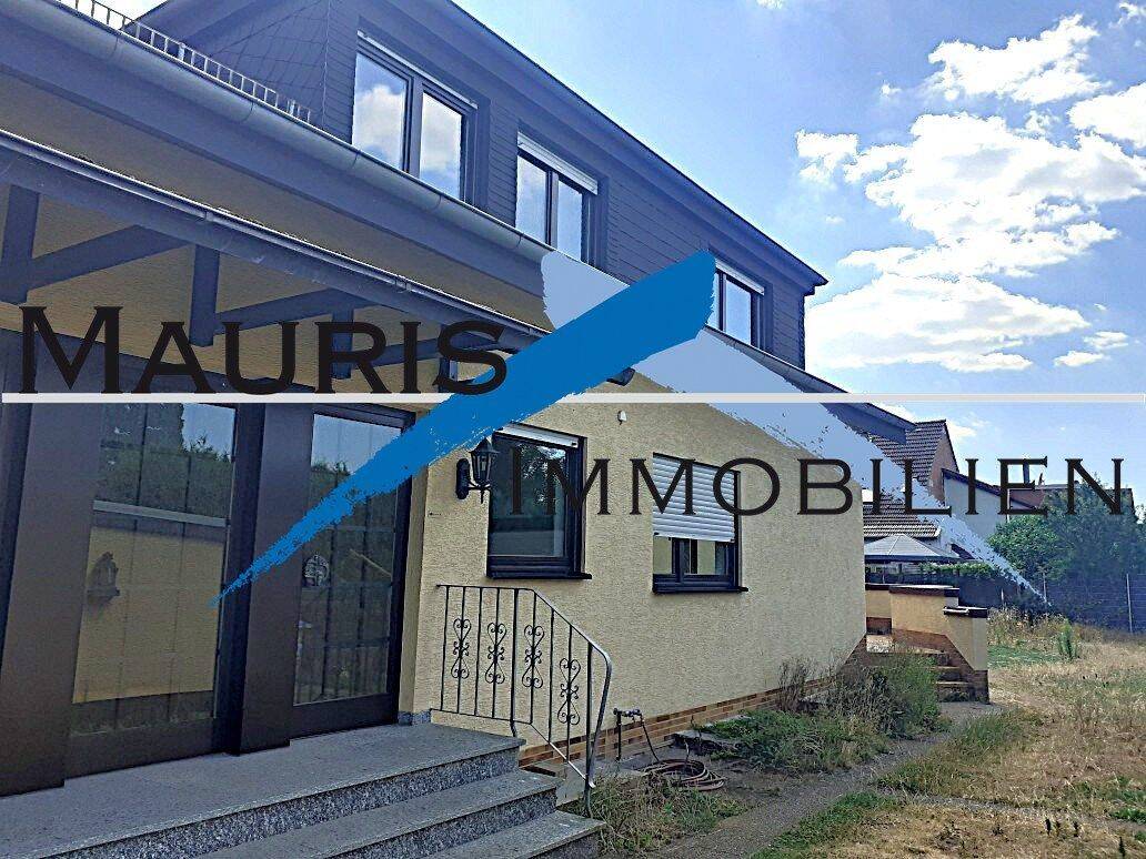 Haushälfte mit Terrasse, Garten und Garage