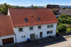 Pfuhler Investmentchance - gepflegtes Zweifamilienhaus mit vielen Optionen