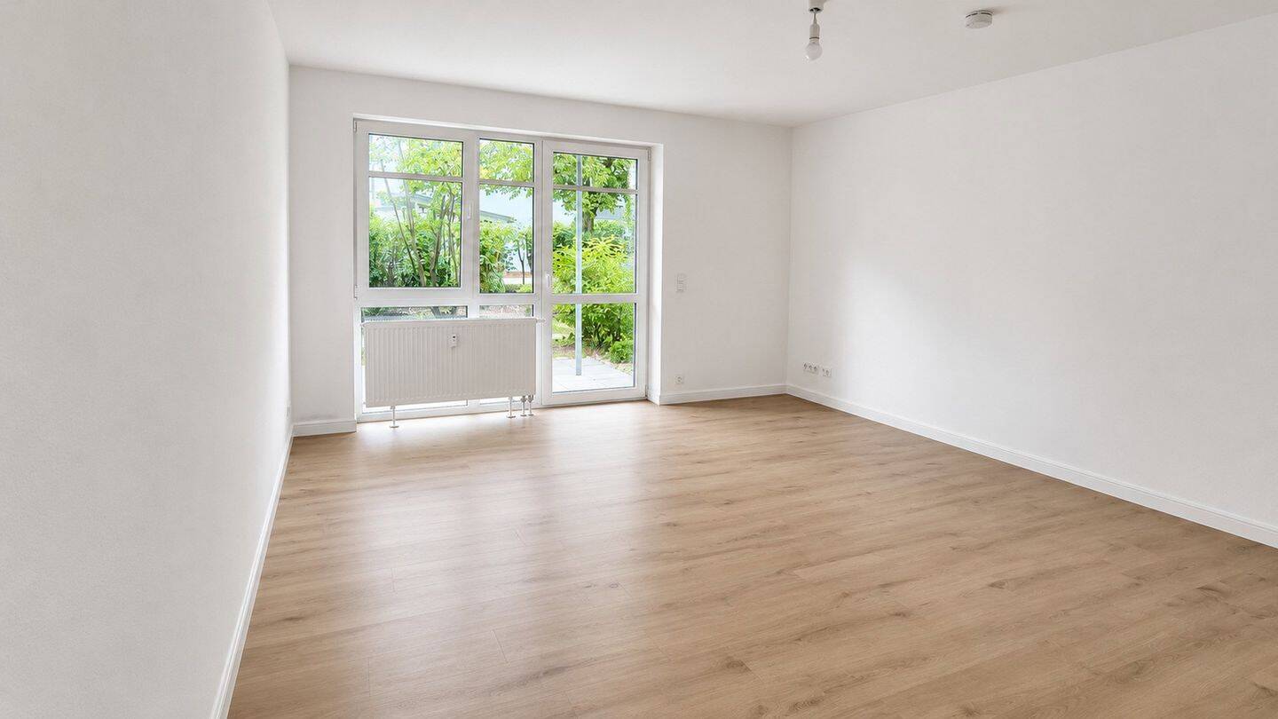 Charmantes, renoviertes Apartment mit Terrasse, kleinem Garten & Tiefgaragenstellplatz in Regensburg