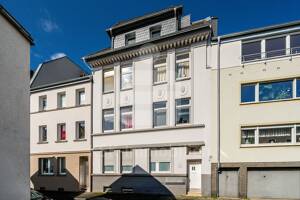 Attraktives Mehrfamilienhaus mit sonnigem Gartenzugang als solide Kapitalanlage
