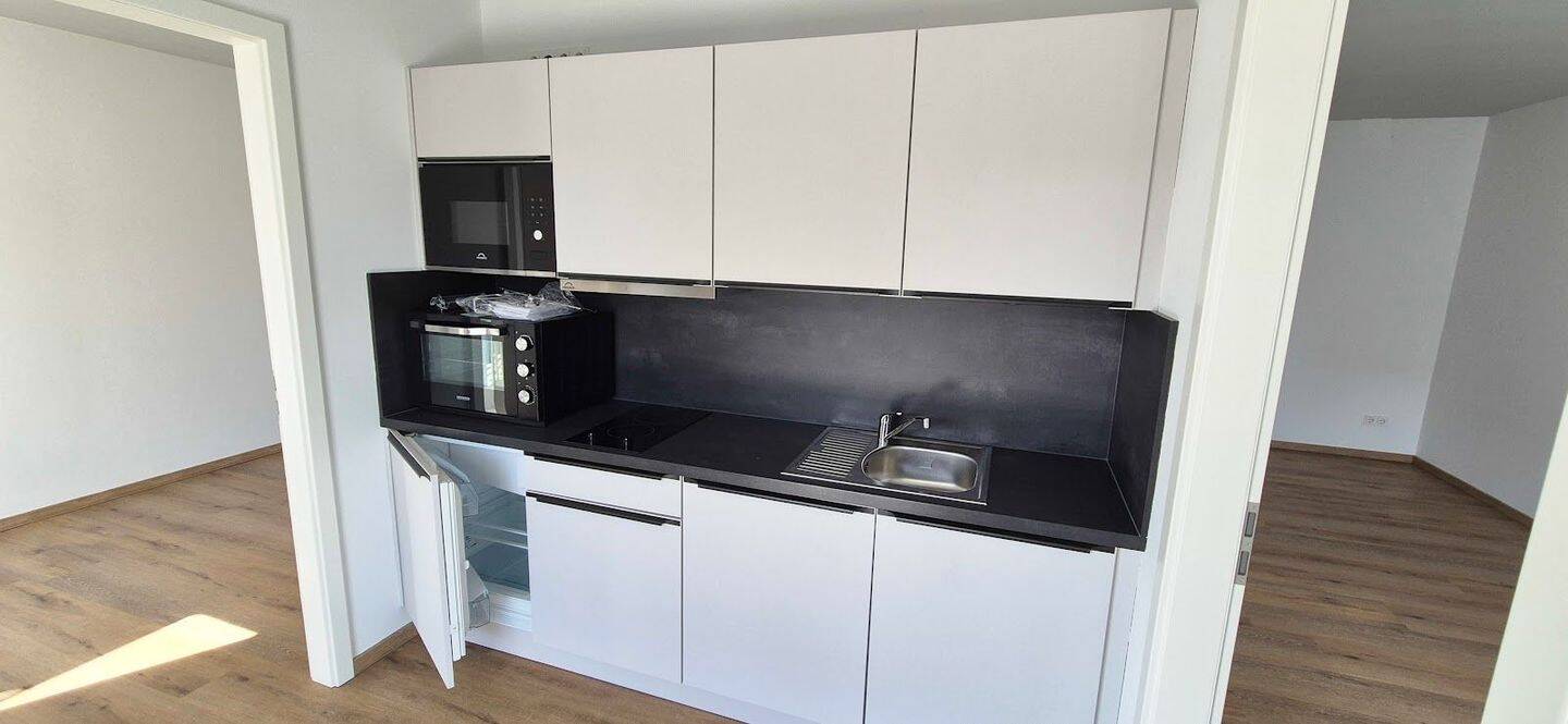Genießen Sie das Wohnen mit Balkon! Helle 2 Zimmer, Einbauküche + Aufzug + TG-Platz – Aachen – Vorschaubild 4