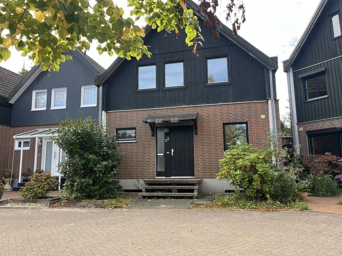 PURNHAGEN-IMMOBILIEN - Reihenendhaus in Holzständerbauweise in ruhiger Lage von Bremen-Grohn – 28759 Bremen – Bild 1 von 9