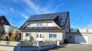 VERKAUFT!! MIT BLICK AUF FREIES FELD UND MITTELLANDKANAL! Wohnhaus mit Einliegerwohnung und Garage in Bad Essen-Wimmer! – Auf dem Esche 46, 49152 Bad Essen – Vorschaubild 3