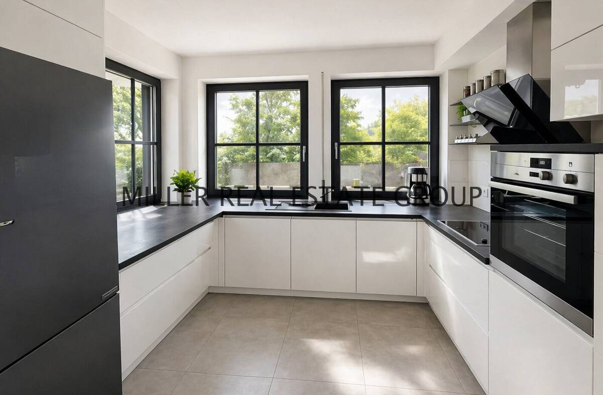 Exklusive Gartenwohnung in Ingolstadt mit Hauscharakter, großer Terrasse, Garage, zwei Stellplätzen & zusätzlichem Apartment-Bereich im Untergeschoss! – 85055 Ingolstadt – Bild 1 von 9