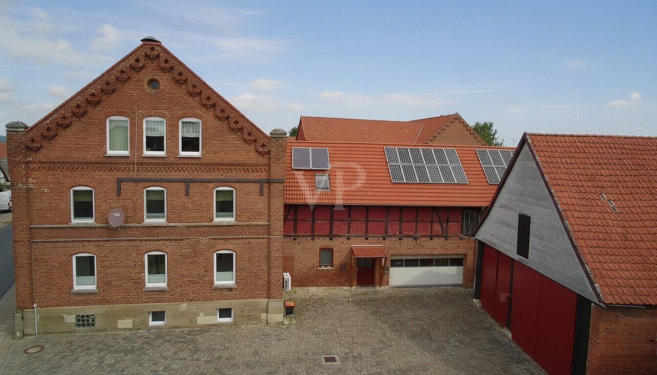 Vielseitiges Mehrfamilienhaus mit drei Wohnungen, Nebengebäuden und Entwicklung auf großem Areal – Coppenbrügge – Vorschaubild 3