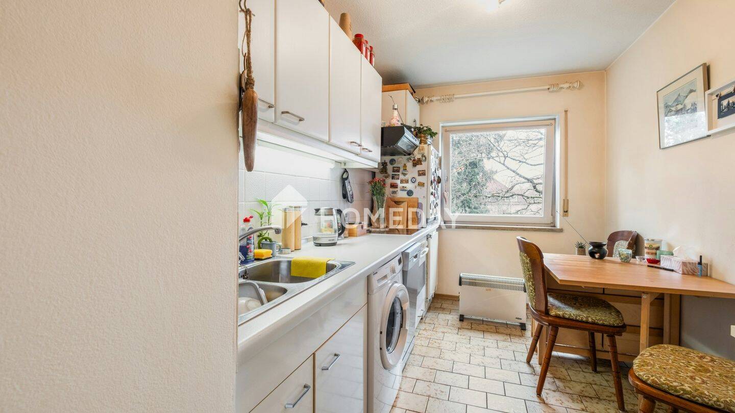 Urbaner Rückzugsort mit Weitblick: Etagenwohnung mit Balkon und Tiefgarage – München – Vorschaubild 4