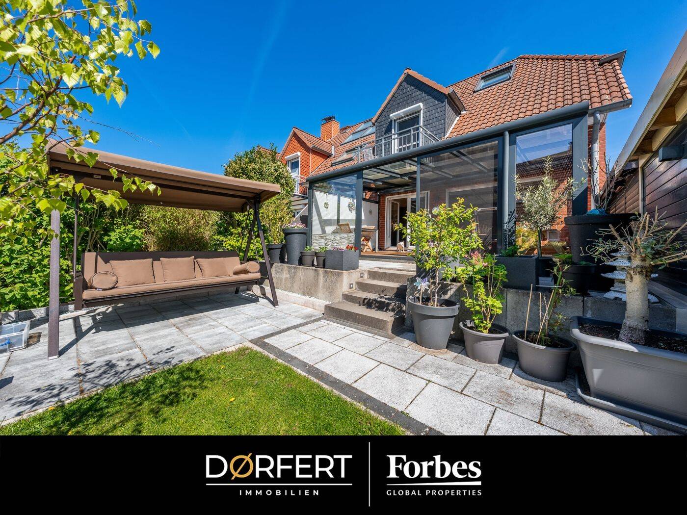 Modernes Wohnen im grünen Barsbüttel: Reihenendhaus mit Gartenidylle und Doppel-Carport