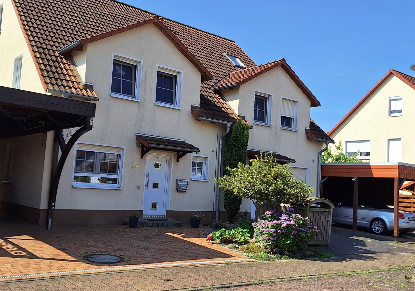 Charmante Doppelhaushälfte mit Wintergarten, Garten und Carport in Wolfsburg-Wendschott – Wolfsburg – Bild 1 von 9