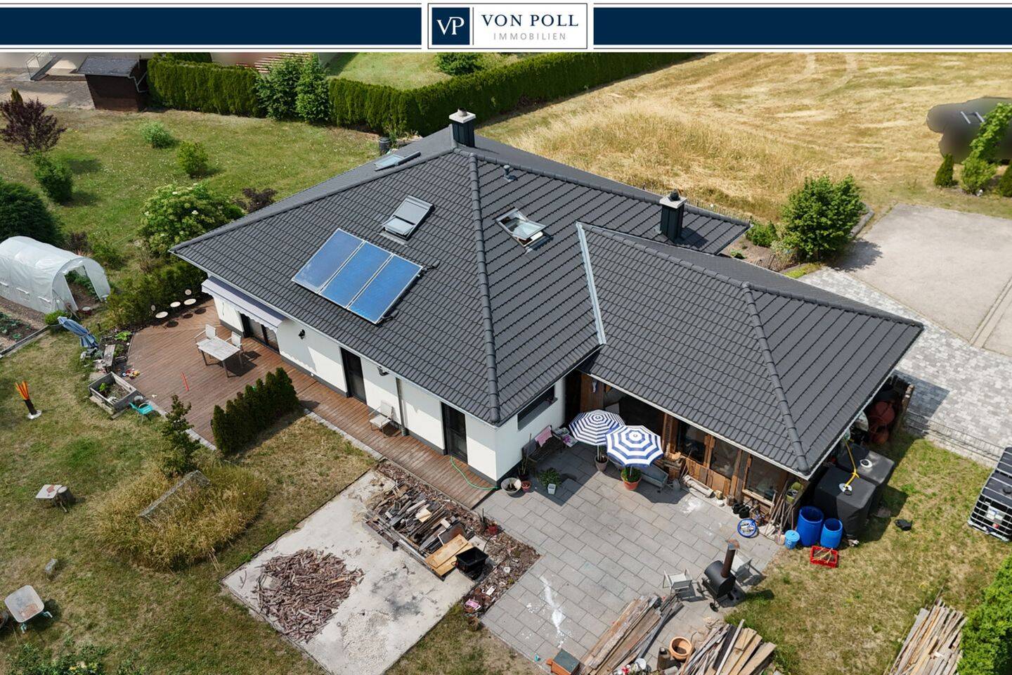 Exklusiver Bungalow mit hochwertiger Ausstattung, Doppelcarport und traumhaftem Garten
