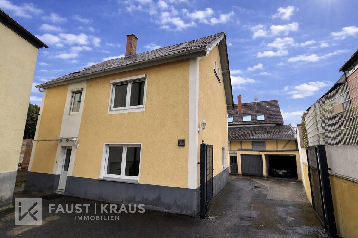 Umfangreich modernisiertes Einfamilienhaus in zentraler Lage mit Garage, Scheune und Garten – Hösbach – Bild 1 von 9
