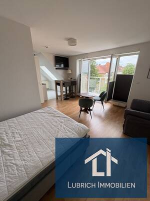 Möblierte DG-Wohnung mit Balkon, Aufzug & TG-Stellplatz