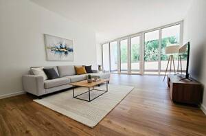 Neubaukomfort im Erstbezug: Helle 3-Zimmerwohnung mit zwei Balkonen, EBK und Tiefgaragenstellplatz