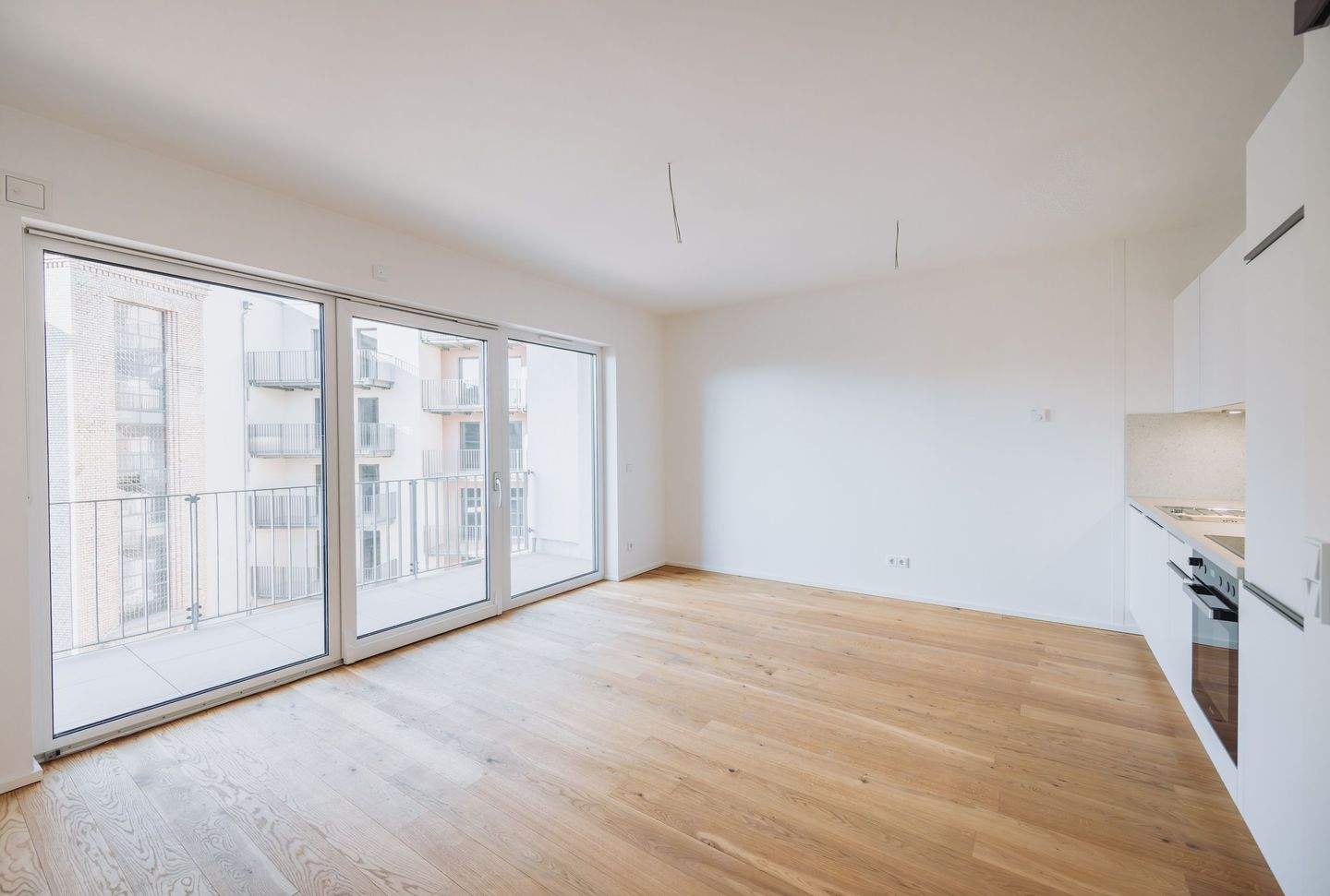 Neubaukomfort: Stilvolle 1-Zimmer-Wohnung mit Einbauküche und Balkon