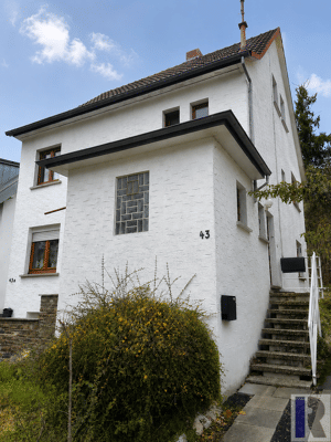 Maisonette-Wohnung mit großer Dachterrasse, Gartenanteil und Stellplatz