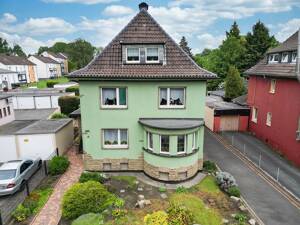 Großzügiges Zweifamilienhaus mit weitläufigem Grundstück, zwei Garagen und vielseitigem Nutzungspotenzial – 44339 Dortmund – Vorschaubild 2