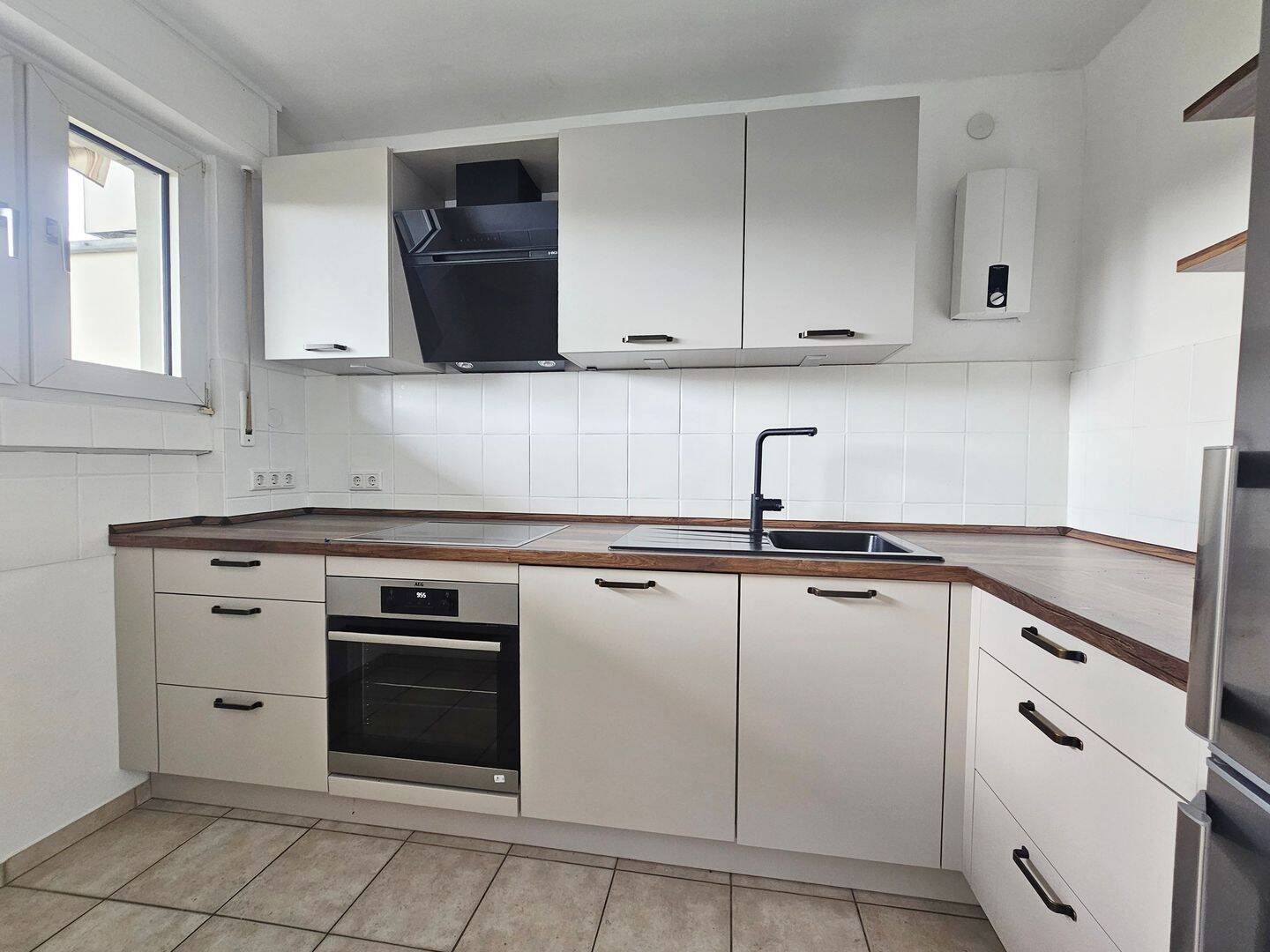 Lichthelle Erdgeschosswohnung mit XXL-Balkon und Einbauküche an der Stadtgrenze zu Haan und Hilden – Solingen – Vorschaubild 3