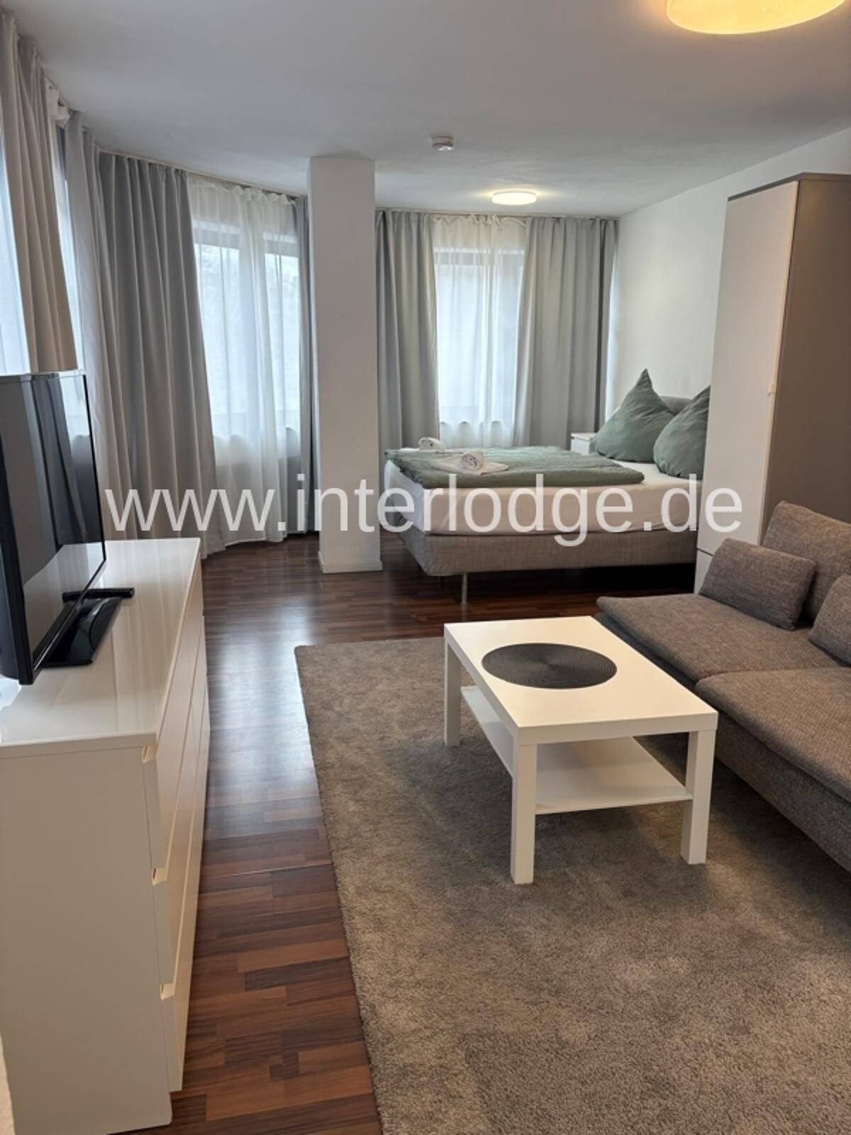 INTERLODGE Modern möbliertes Apartment mit offener Küche in der Bochumer Innenstadt. – 44787 Bochum – Bild 1 von 8