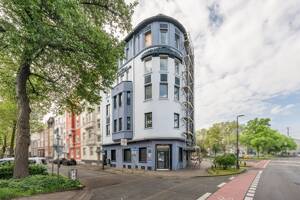 Value-Add Investment: Aufgeteiltes Wohn- & Geschäftshaus in zentraler Lage