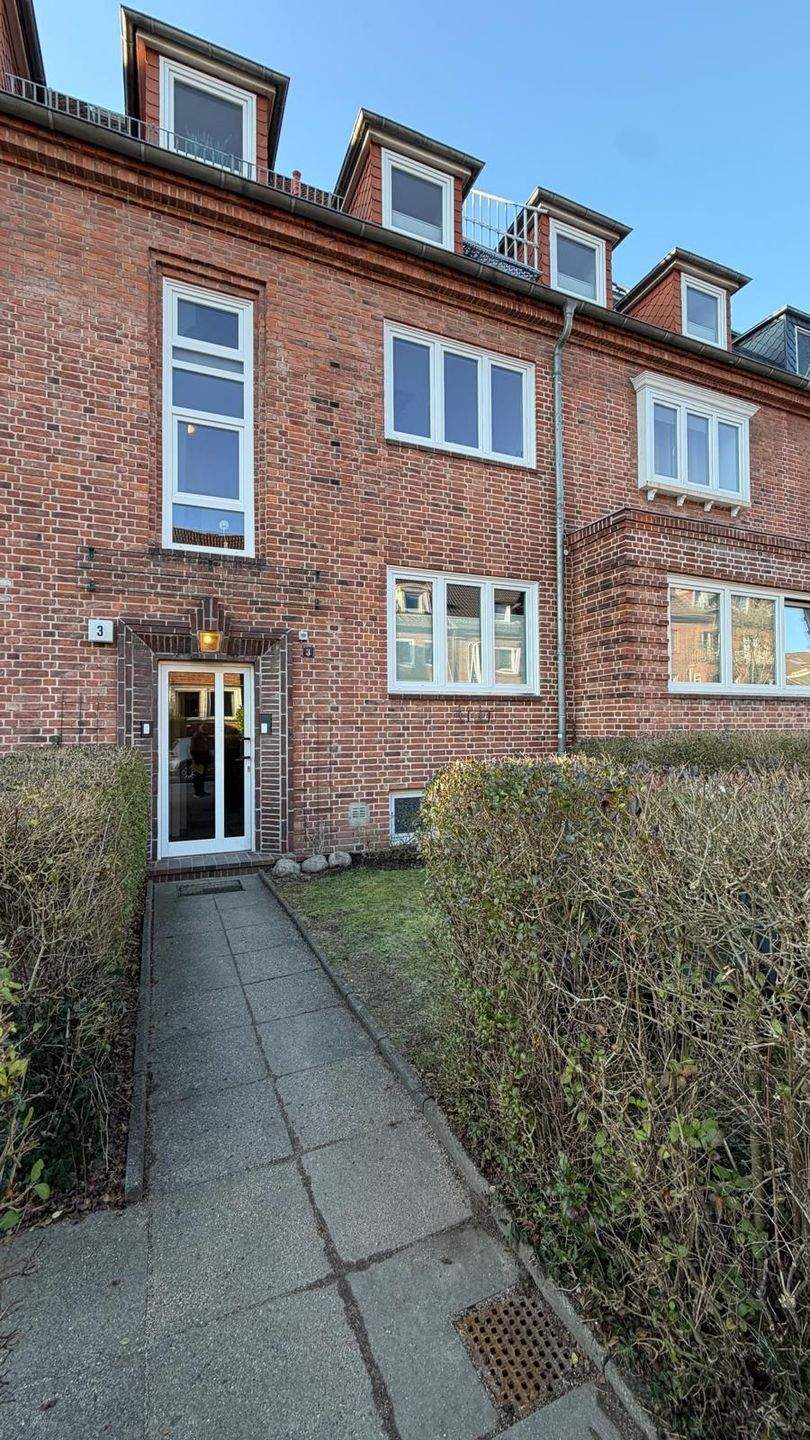 Helle 2,5-Zimmer-Erdgeschosswohnung am Blücherplatz mit Wintergarten und Garten