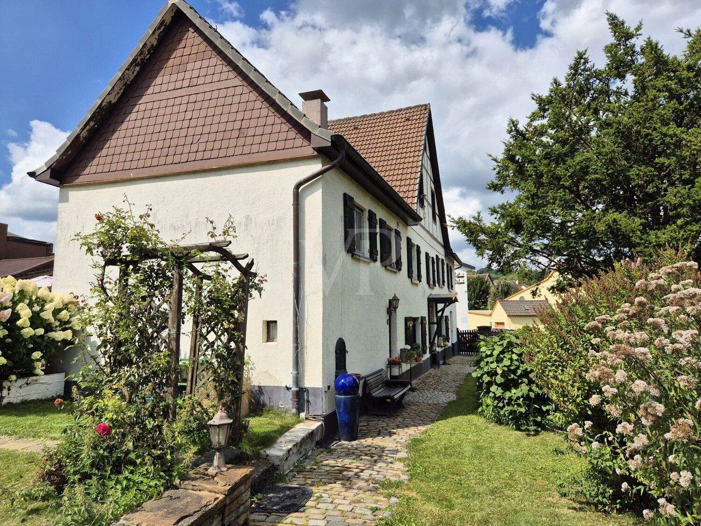 Einfamilienhaus mit Einliegerwohnung in Hemer-Ihmert zum fairen Kaufpreis – Hemer – Bild 1 von 9