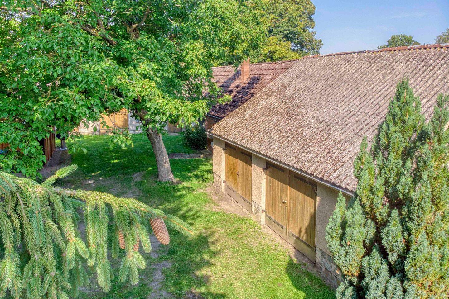 Renovierungsbedürftiges Einfamilienhaus samt Garten, 2 Garagen und 3 Freistellplätzen – Neuenkirchen – Vorschaubild 5