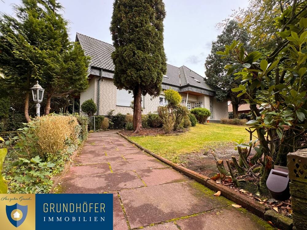 Zweifamilienhaus mit parkähnlichem Grundstück in traumhafter Lage in Bösel – Bösel – Bild 1 von 9